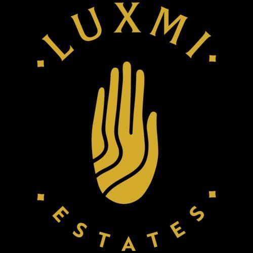 Luxmi Tea Estates logo